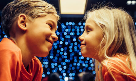 brother sister background festive garland new year lights children 1