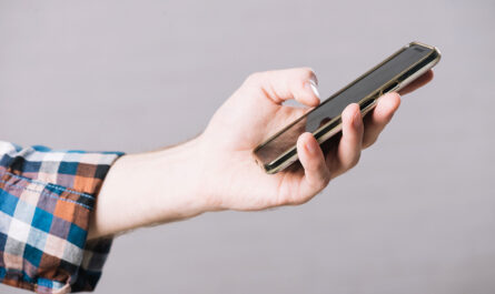 crop hand man with smartphone
