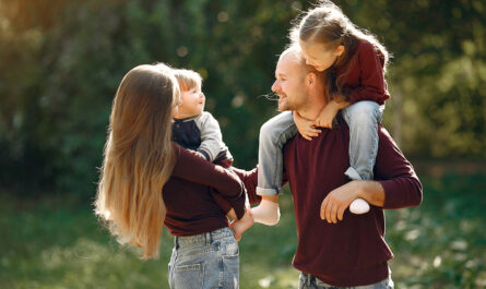 family with cute kids autumn park