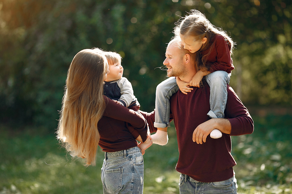 family with cute kids autumn park