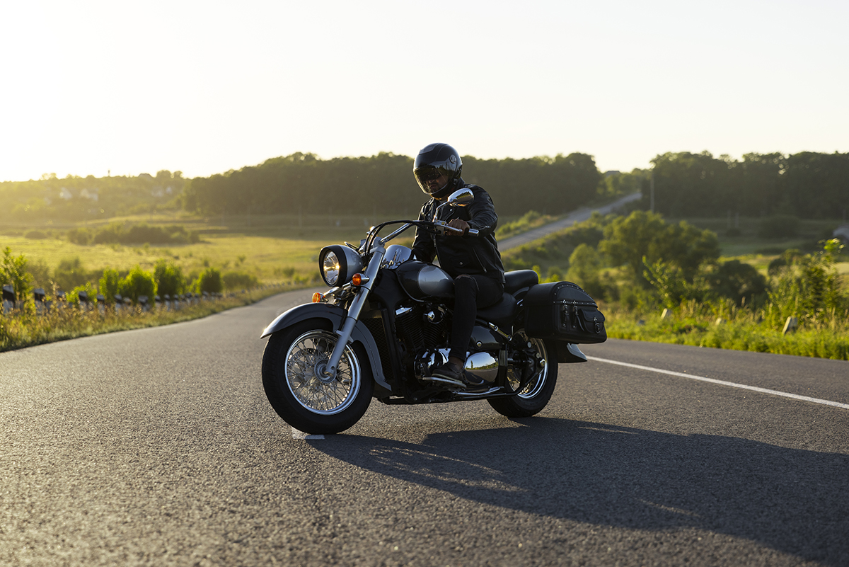 full shot man riding motorbike