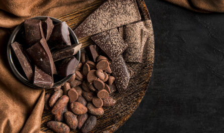 top view dark arrangement with chocolate with copy space