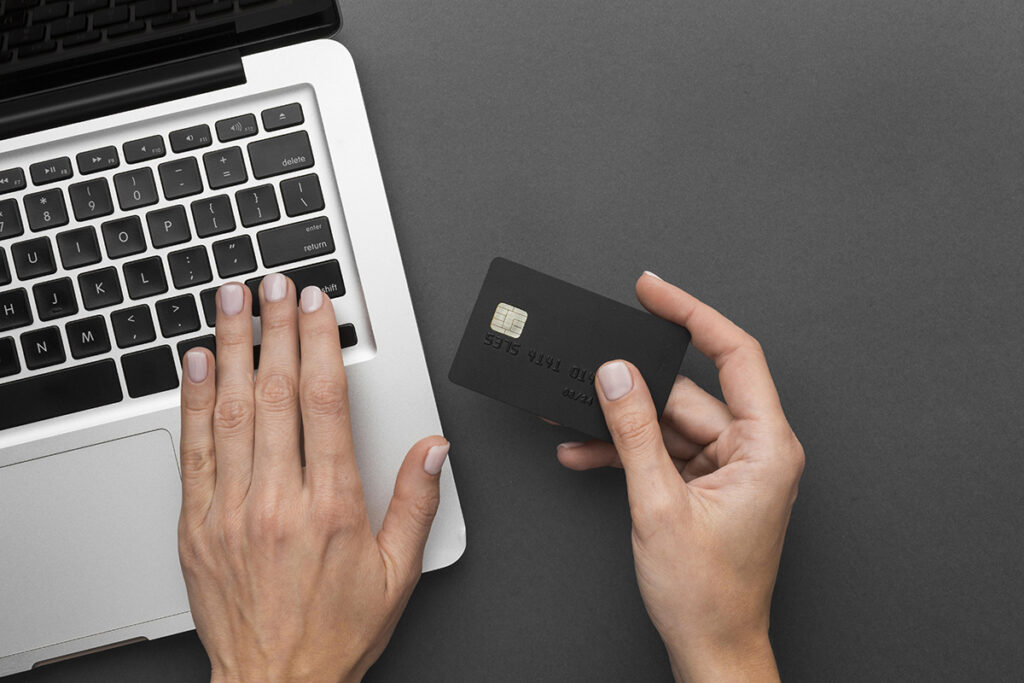 top view laptop black shopping card