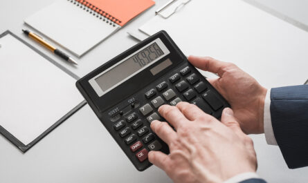 business concept with hands using calculator 1