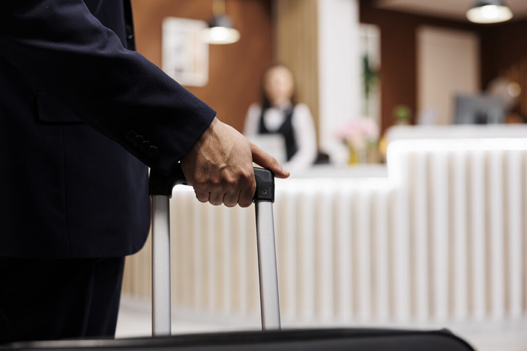 businessman arriving hotel lobby