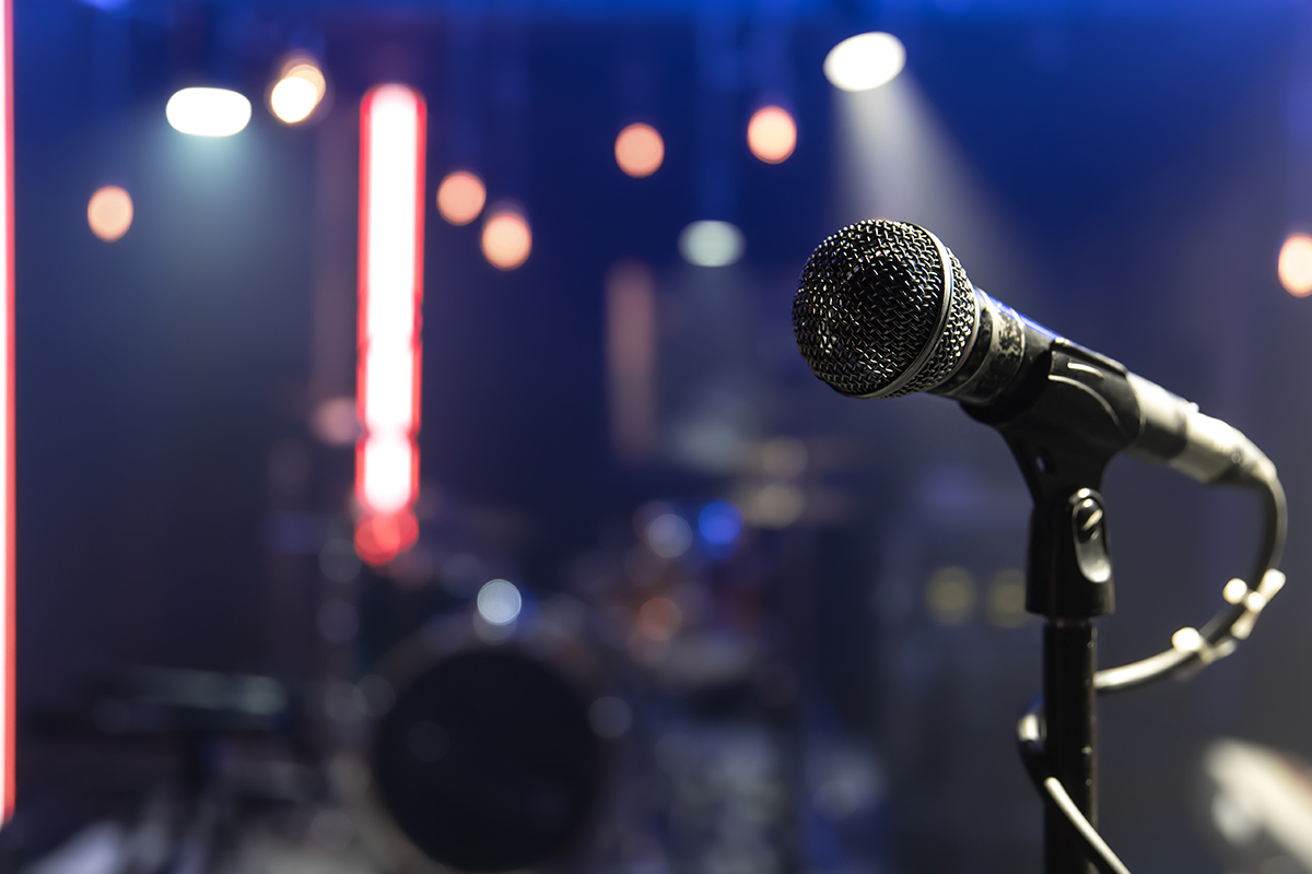 close up microphone concert stage with beautiful lighting