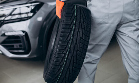 mechanic changing tires car service