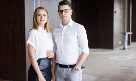 portrait confident business colleagues posing office building