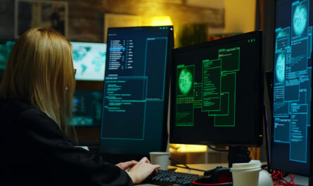 beautiful hacker girl working with another dangerous cyber criminals hackers centre