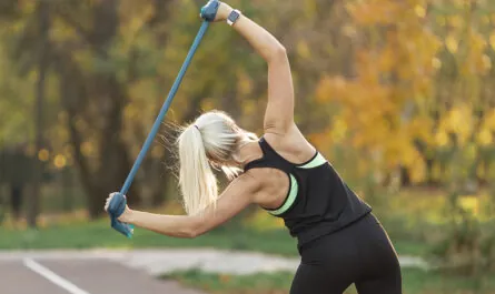 athletic blonde woman doing fitness exercises