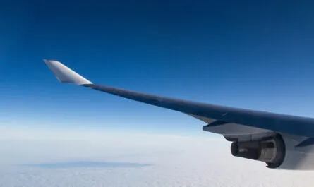 beautiful shot from airplane window wings clouds