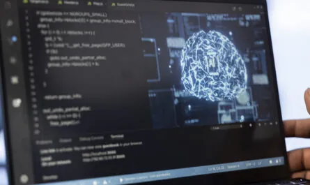 computer scientist using laptop data center updating ai