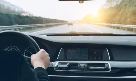 man driving car from rear view