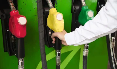 man putting gasoline fuel into his car pump gas station 1