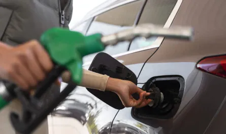 view woman with car gas station