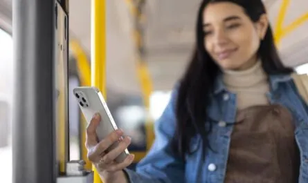 medium shot woman holding phone 1